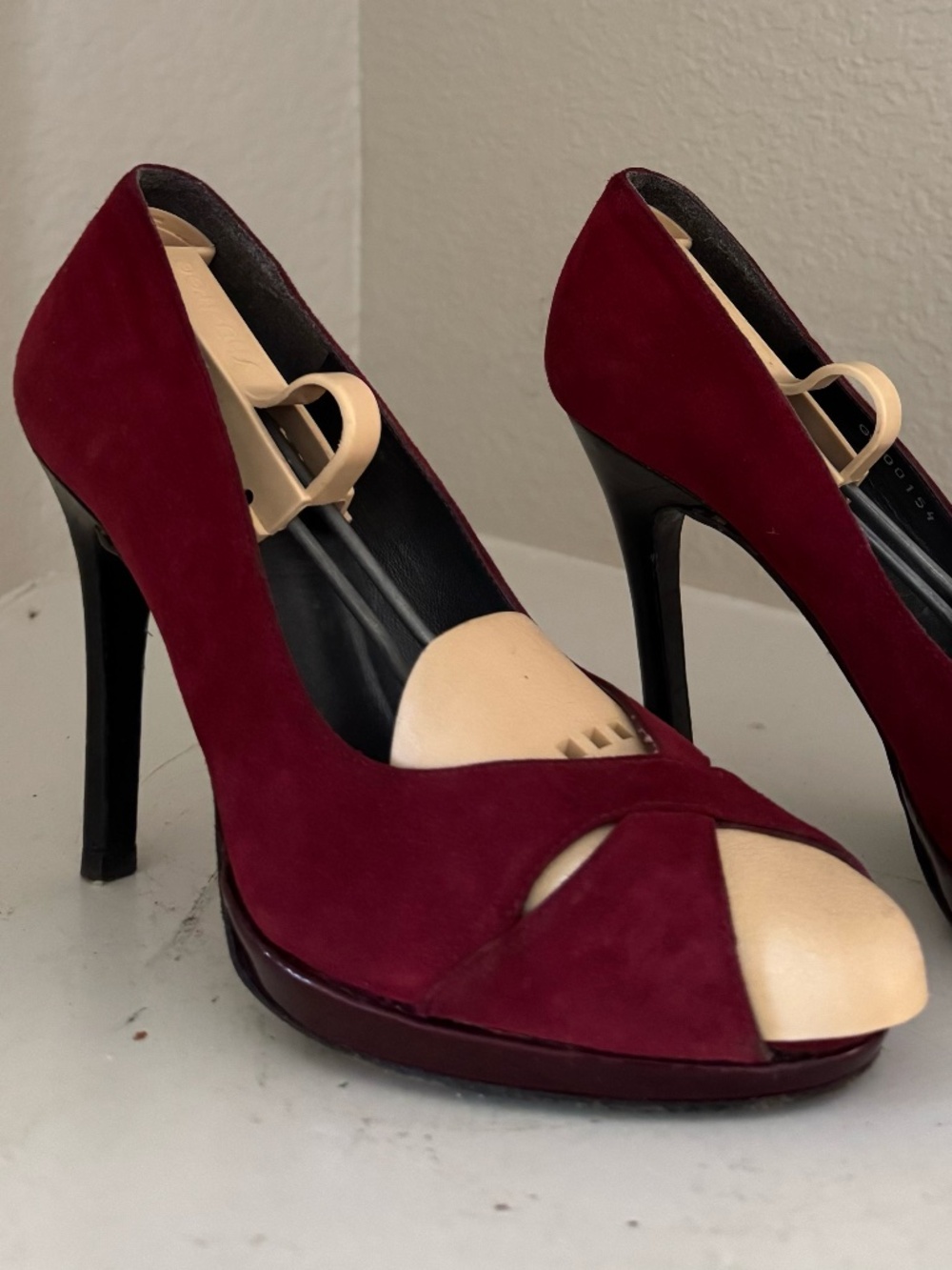 Stuart Weitzman ruby suede heels.